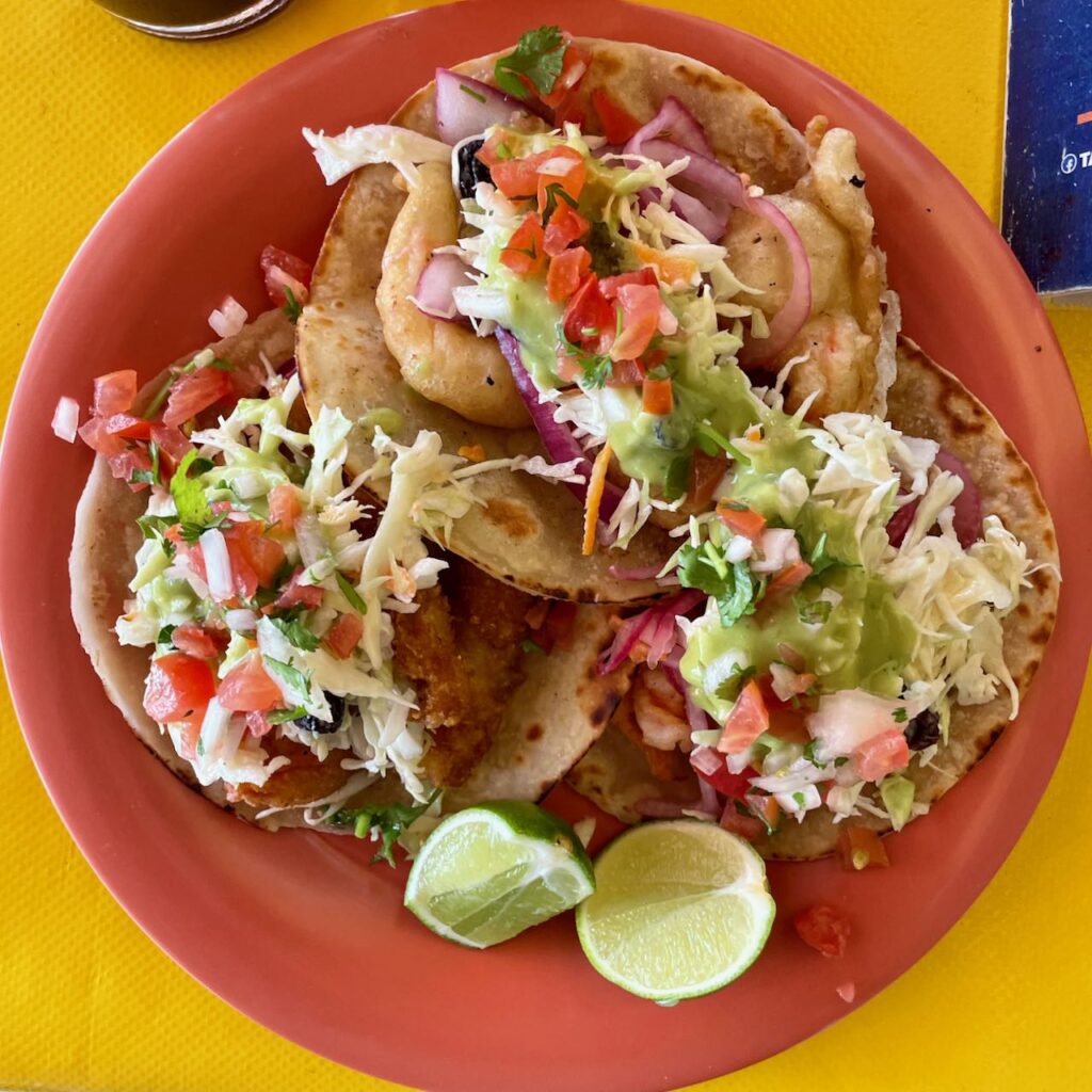 Grilled, breaded, and crispy shrimp tacos at Los Claros