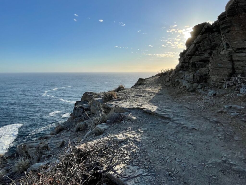 Path leading around a corner sea view Punta Lobos