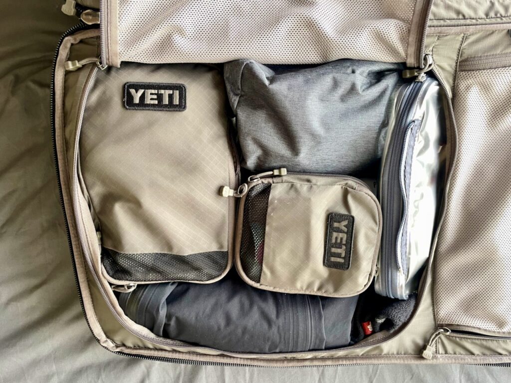 Clamshell large compartment packed Yeti Crossroads 28l