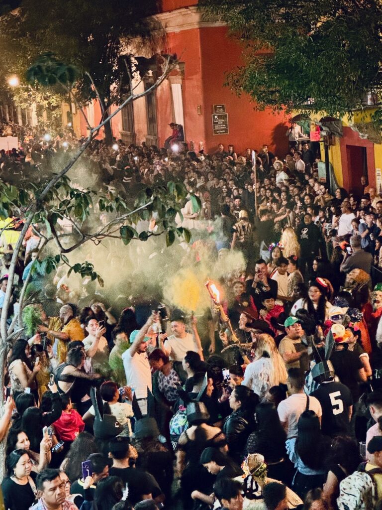 A packed street Day of the Dead Oaxaca City