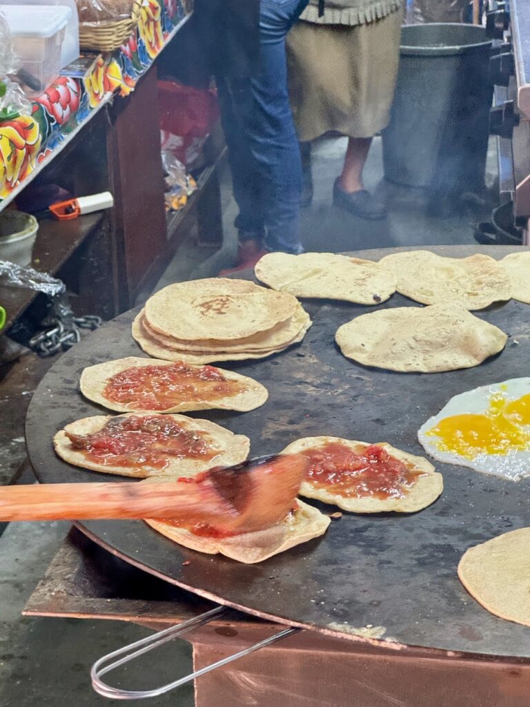 Memelas on the griddle at Doña Vale’s