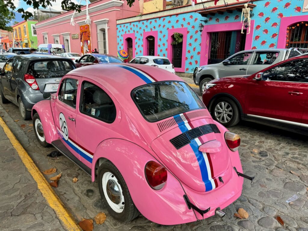 Pink volkswagen bug Jalatlaco Oaxaca